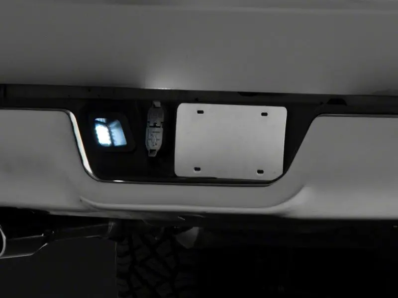 Raxiom 13-18 Dodge Ram 1500 Axial Series Led License Plate Lamps- Smoked 2
