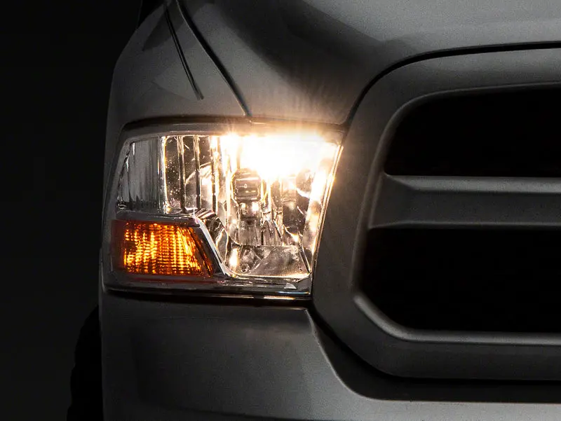 Raxiom 09-18 Dodge Ram 1500 Axial Oem Rep Headlights W/ Single Bulb- Chrome Housing (Clear Lens) 1