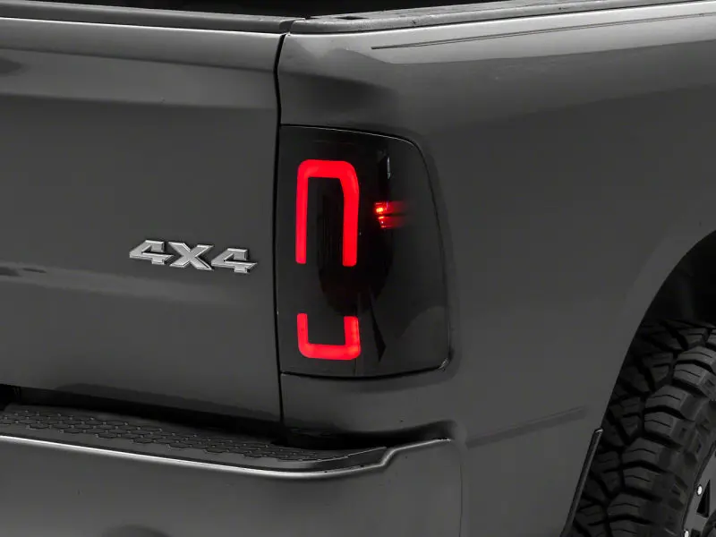Raxiom 09-18 Dodge Ram 1500/2500/3500 Axial Series Led Tail Lights- Blk Housing (Smoked Lens) 1