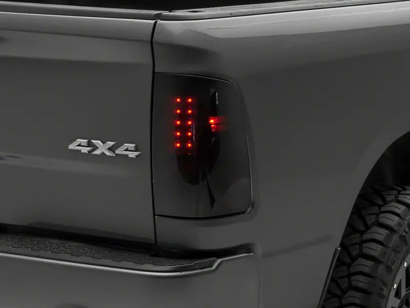 Raxiom 09-18 Dodge Ram 1500/2500/3500 Axial Series Led Tail Lights- Blkhousing- Smokedlens 1